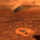 Illustration for article titled Probe data reveals a surface on Titan that's soft, sandy, and fragile